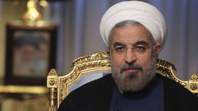 President Rouhani slams US-led coalition against ISIL