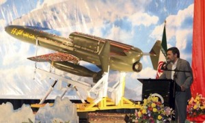 Iranian President Ahmadinejad delivers a speech during the unveiling ceremony of a long-range drone, the Karrar, in Tehran
