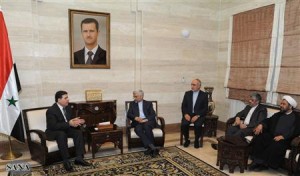 Syrias Prime Minister Wael al-Halqi meets Iran's Supreme National Security Council Secretary Saeed Jalili in Damascus