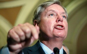 FILE - In this Nov. 29, 2011, file photo Sen. Lindsey Graham, R-S.C. speaks to reporters following a Republican policy meeting on Capitol Hill in Washington. Lawmakers who came to Washington demanding budget cuts face a tough test now that President Barack Obama and military leaders want to shrink the force, shut down bases and cancel weapons to achieve them. "It's funny that we want to save money everywhere except when it can bother us," Graham, a member of the Armed Services Committee, said in an interview. He's one of the few lawmakers who favors another round of domestic base closings.  (AP Photo/Manuel Balce Ceneta, File)