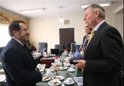 head of the Center for Interreligious Dialog and Civilization from the Islamic Culture and Relations Organization (ICRO), Ali Mohammad Helmi meets Austria�s Ambassador to Iran Friedrich Stift in Tehran on February 28, 2015.
